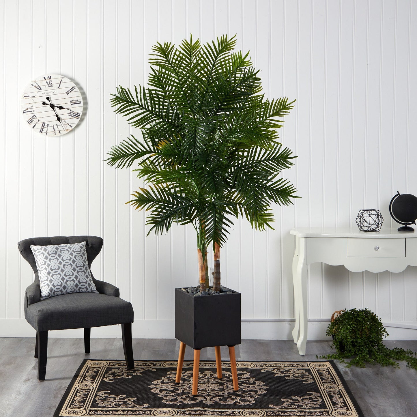 Lifelike Areca Palm tree in black planter with stand, adding height and natural beauty to contemporary home decor