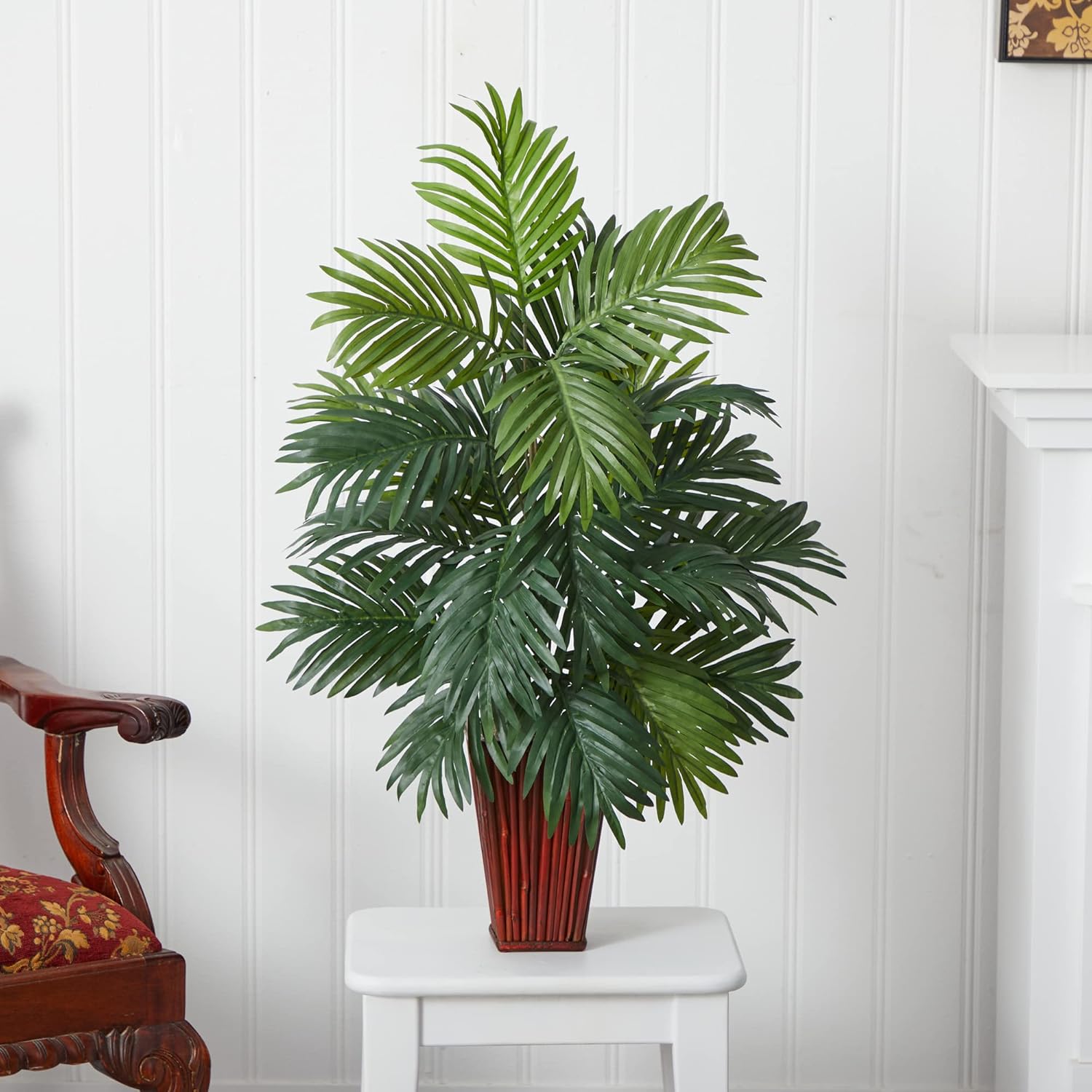 Realistic Areca Palm plant in stylish bamboo vase